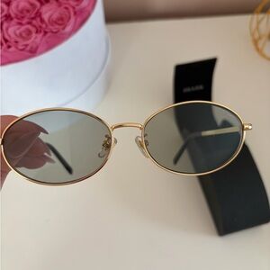 Prada Gold and Black Women's Sunglasses
